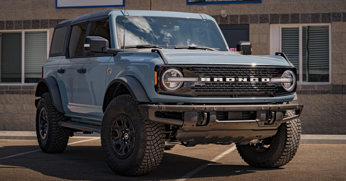 tinted windows on a blue ford bronco