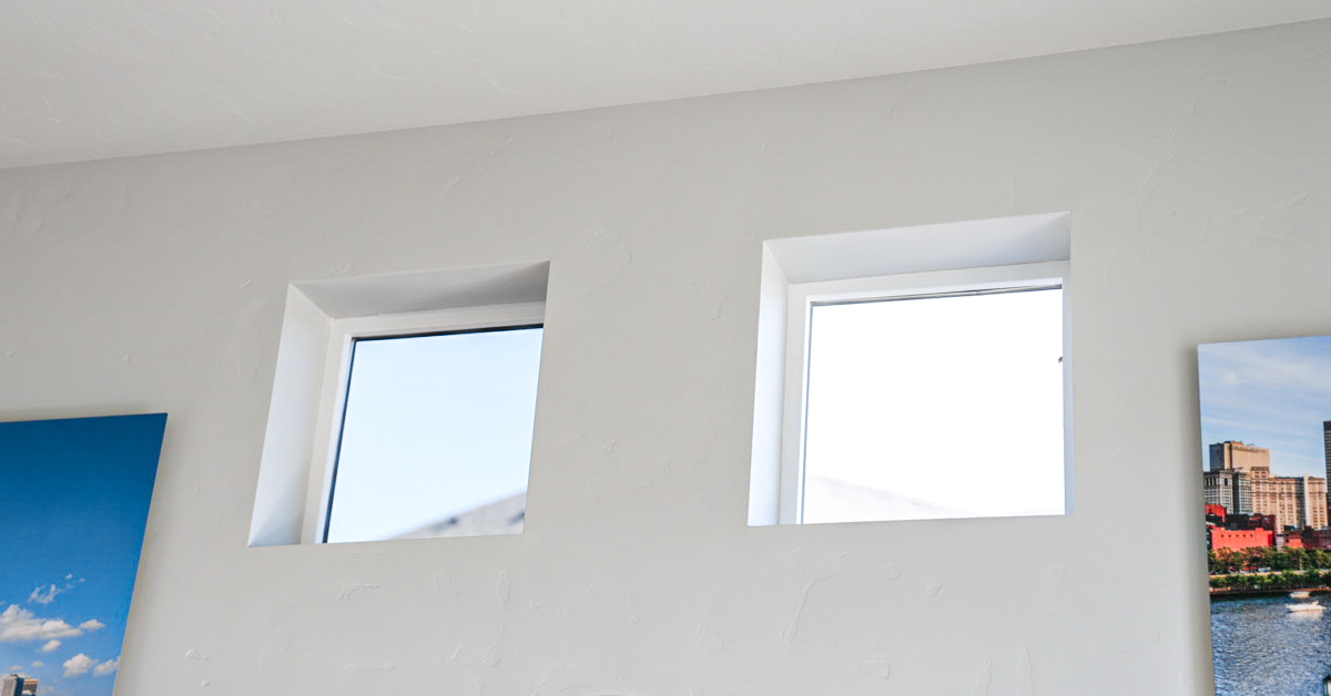 comparison of a tinted home window and a non-tinted home window